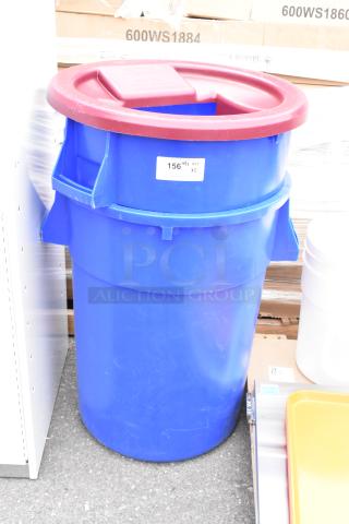 Brand new Lavex 44-gallon blue commercial trash can. Scratch and dent, round design, with visible lid and label.