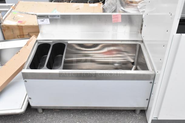 Brand new Regency 600IB2436S Spec Line 24"x36" underbar ice bin, 119 lb capacity, with minor scratches and dents.