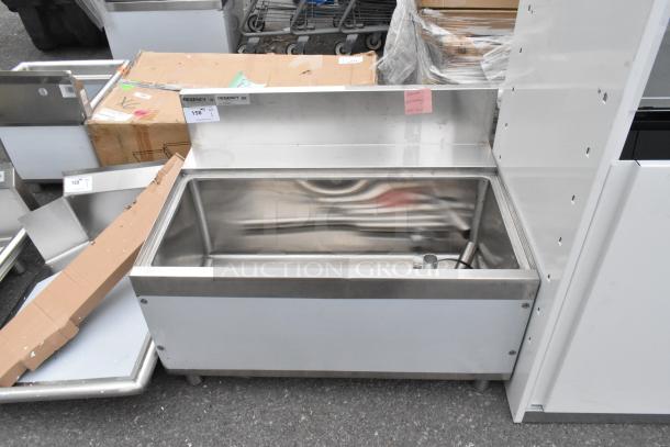 Brand new Regency 600IB2436S Spec Line 24" x 36" underbar ice bin, 119 lb capacity. Slight scratch and dent condition.
