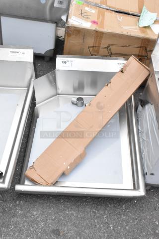 Brand new Regency 600CDT24R 16 gauge, 2' clean dish table with right drainboard. Slight scratches, visible packaging.