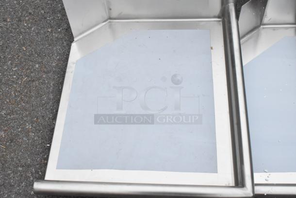 Brand new Regency 600CDT24R clean dish table, 16 gauge, 2', stainless steel, right drainboard, scratch and dent condition.