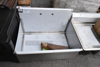 Brand new Steelton 522US13624 utility sink, 36"x24"x14", with drainboard, 8" center faucet holes, slight scratches.