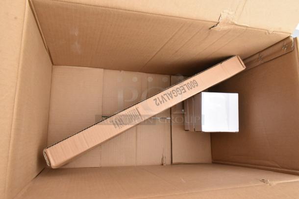 Cardboard box containing branded packaging for a Steelton 522CS31620LR Stainless Steel 3 Bay Sink with dual drain boards.