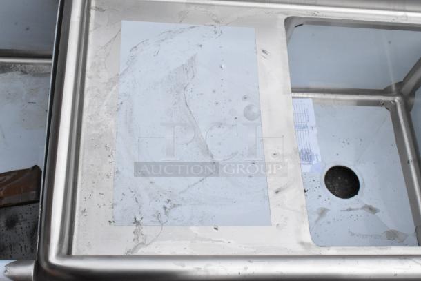 Steelton 522CS31620LR stainless steel 3 bay sink with dual drain boards, brand new, visible scratches and dents.