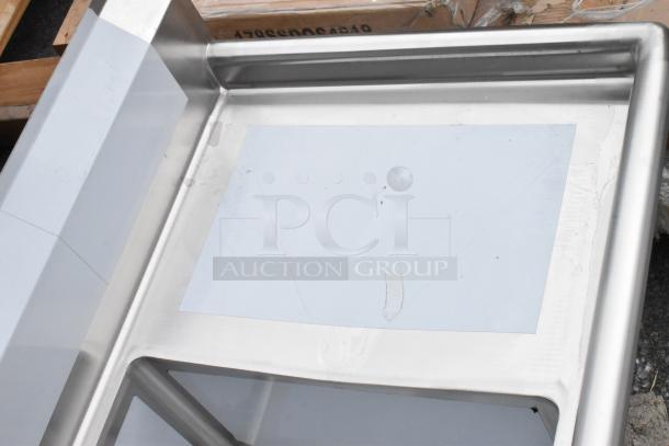 Brand new Steelton 522CS31620LR stainless steel 3 bay sink with dual drain boards, scratch and dent condition.