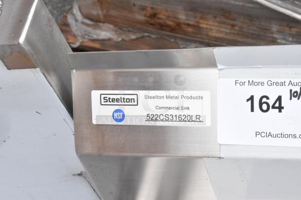 BRAND NEW Steelton 522CS31620LR Stainless Steel 3 Bay Sink, NSF-certified, with dual drain boards, scratch and dent condition.