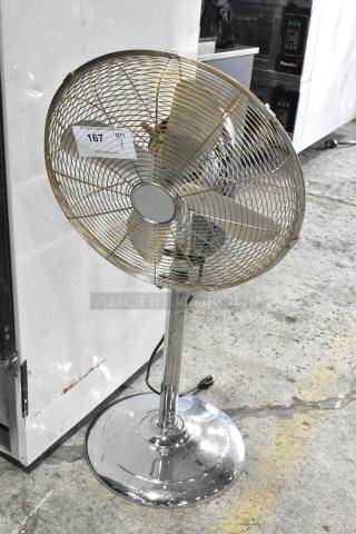 HIFANXSTAND16METALF metal floor fan, 120V, 1 phase. Standing style, chrome finish, visible wear, auction tag "167" attached.