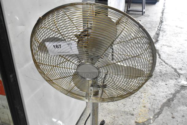 HIFANXSTAND16METALF metal floor fan, 120 volts, 1 phase, in used condition. Auction tag 167 visible.