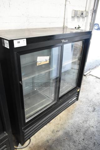 2019 True 2 Door Reach-In Cooler Merchandiser, poly-coated racks, 115V, good condition, visible brand logo.
