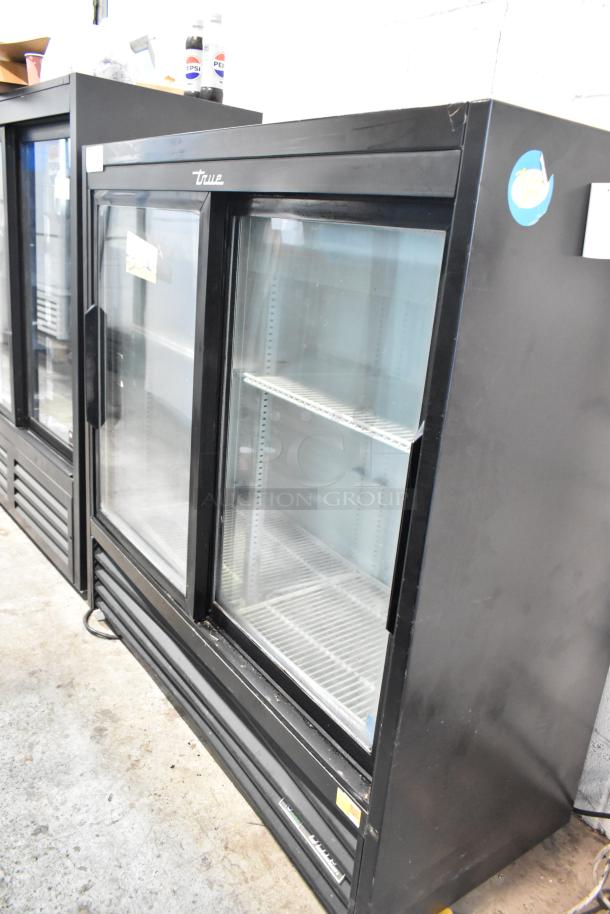 2019 True Metal 2 Door Reach-In Cooler Merchandiser, model with poly coated racks, in used condition, 115 volts, 1 phase.