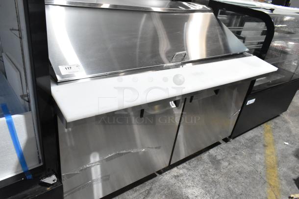 BRAND NEW SCRATCH AND DENT! Avantco 178APT60MHC stainless steel 2-door refrigerated sandwich prep table on casters.
