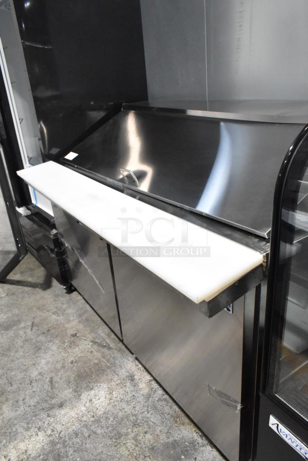 Brand new Avantco 178APT60MHC stainless steel 2-door sandwich prep table. Scratch and dent condition, commercial casters.