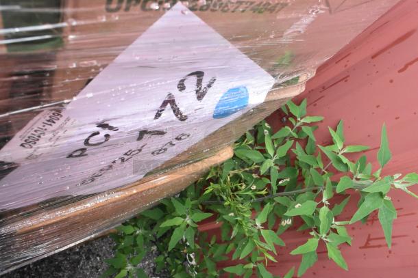 Boxes wrapped in plastic film, labeled with PC-12 markings; part of a 28-box lot including kitchen items.