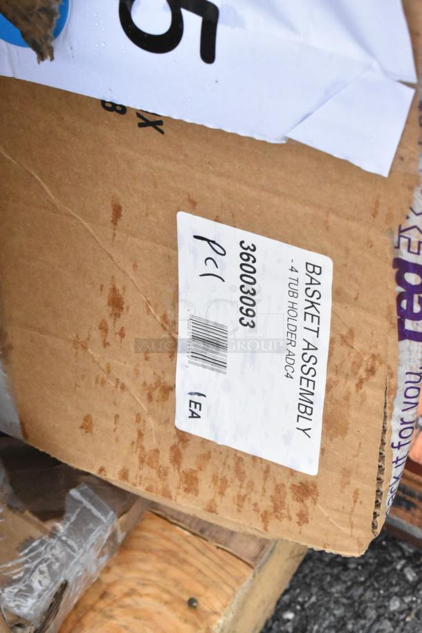 Cardboard box labeled "Basket Assembly, 4 Tub Holder ADC4, 36003093 PC1." Part of 5 new scratch and dent auction items.