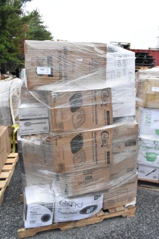 Shrink-wrapped pallet of brand new boxes containing assorted items like plastic plates, food buckets, and hot cups.