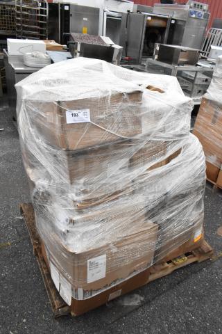 Plastic-wrapped pallet of 28 new scratch and dent boxes containing stock pots, milk bottles, and serving platters. Auction label visible.