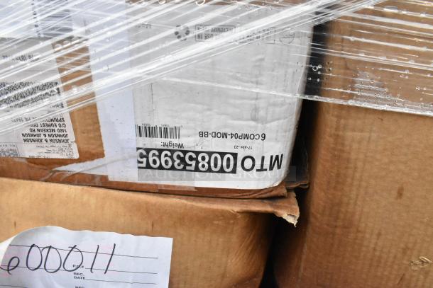 26 brand new scratch and dent boxes containing bowls, napkins, ramekins, stock pot, and champagne flutes. Labels visible.
