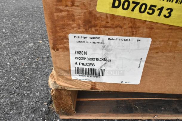 Cardboard box on pallet labeled "49 COMP SHORT RACKS LGN, 6 PIECES, Made in USA." Box 2 of 2 in set.