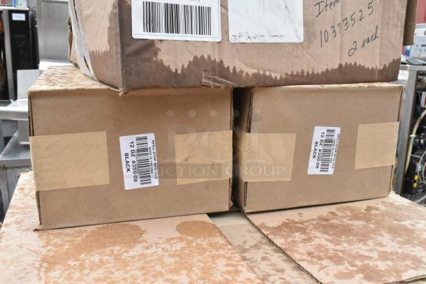 21 boxes marked with "Spill-Stop Mfg LLC" and item codes, containing coffee mugs, pizza peels, and plastic pourers. New condition.