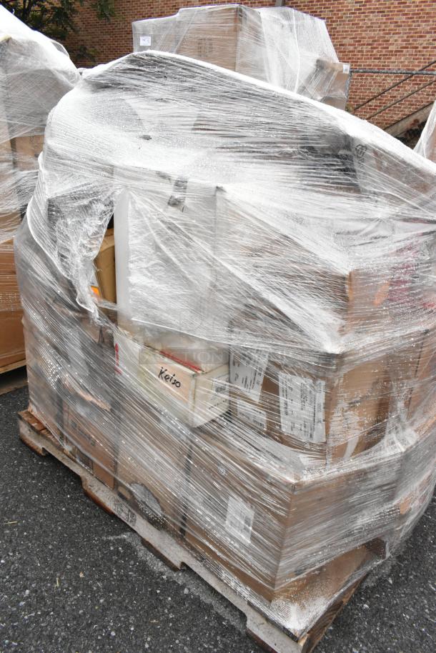 Pallet of 37 shrink-wrapped boxes labeled "Keizo" and others, containing plates and a lamp warmer. Brand new scratch and dent items.