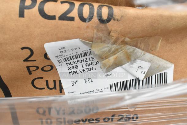 Brown cardboard box labeled PC200 and soufflé plates, with shipping label to Malvern. Boxes are scratch and dent items.