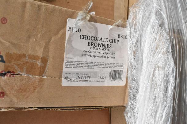 Cardboard box labeled "Chocolate Chip Brownies, Thaw & Serve, 48 pcs, 6lbs, Pre-Cut." Box is brand new, scratch and dent condition.