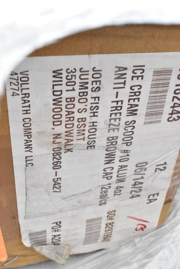 Cardboard box with label showing shipment details from Vollrath Company LLC for ice cream scoops to Joe's Fish House.