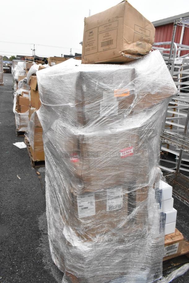 Pallet of 30 brand new scratch and dent boxes, wrapped. Includes plates, glasses, knives. Labels show fragile contents.