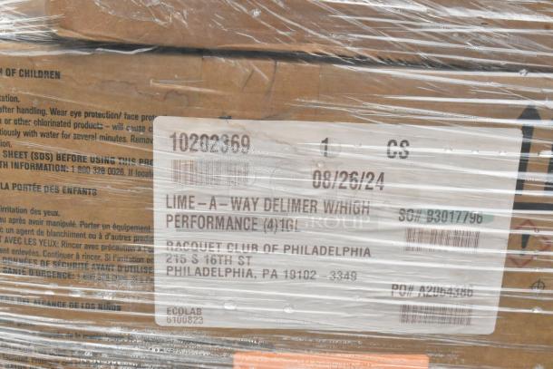 Boxes wrapped in plastic, showing a label for Lime-A-Way Delimer with high performance, dated 08/26/24.