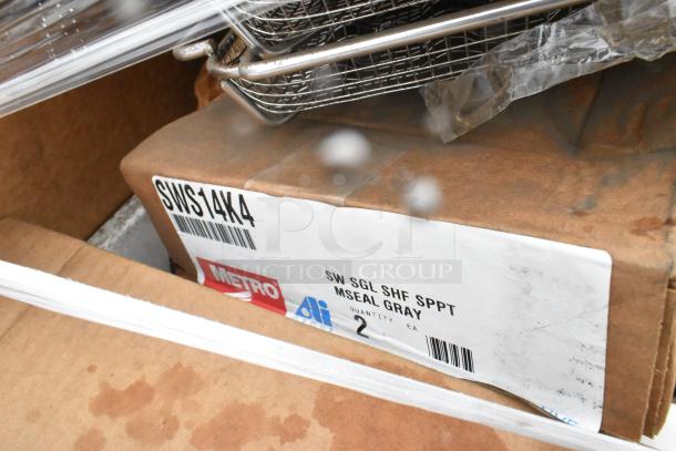 Boxes labeled "Metro" containing new scratch and dent items like plates and bowls. Model SWS14X4, 27 boxes total.