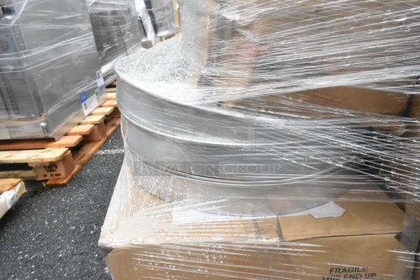 18 boxes of assorted items including heat lamp and dispenser, wrapped on pallets. New, scratch and dent condition.