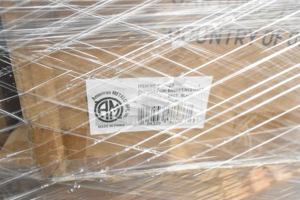Cardboard boxes wrapped in plastic featuring a label from American Metalcraft Inc., indicating nestable black baskets.