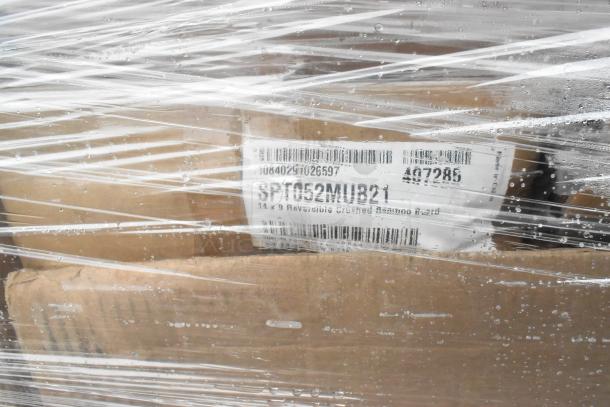 52 new scratch and dent boxes wrapped in plastic, including plates, bowls, and a dispenser. Label shows SPT052MUB21.