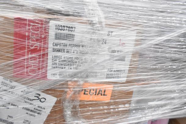 52 new scratch and dent boxes wrapped in plastic. Tags include "Chef Specialties," "Capstan Pepper Mill," and "Shaker Set."