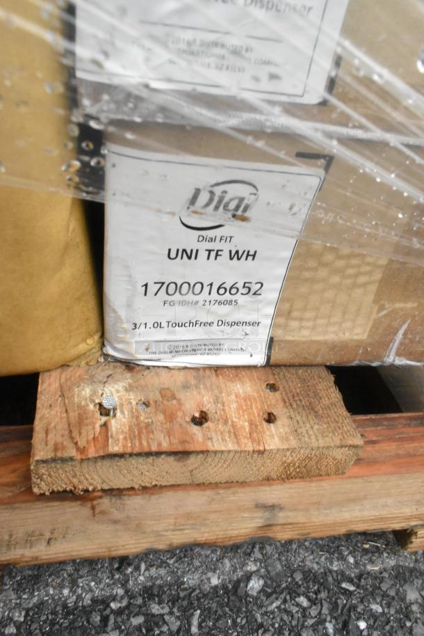 Dial FIT TouchFree Dispenser box with label showing model 1700016652 on wood pallet, wrapped in protective plastic.