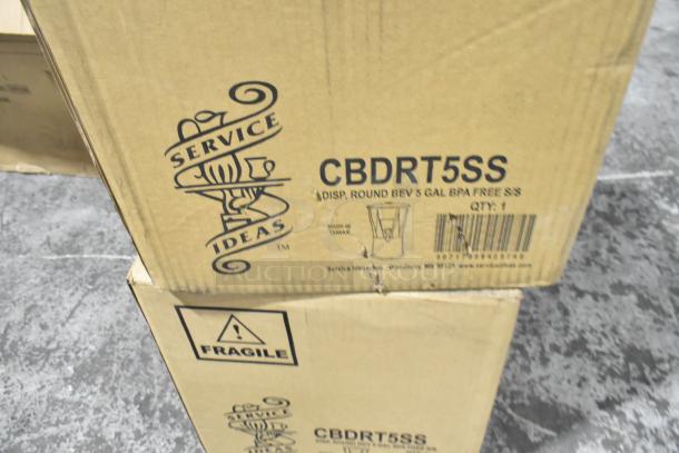 2 new Service Ideas 5 gal beverage dispensers in boxes. Includes infuser & ice tube, model CBDRT5SS, BPA-free, "Fragile" marked.