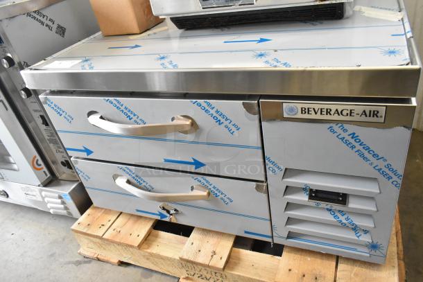 BRAND NEW Beverage Air WTFCS36HC stainless steel commercial 2 drawer chef base, 115 volts, slight scratches and dents visible.