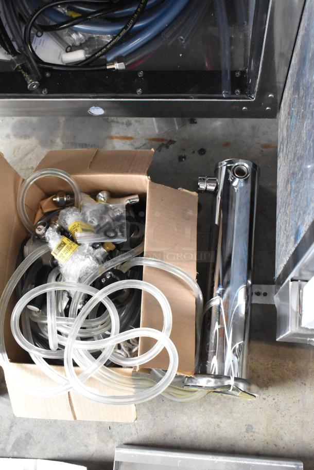 Brand new Perlick DDS36 stainless steel kegerator components with hoses, valves, and a column. Scratch and dent condition.