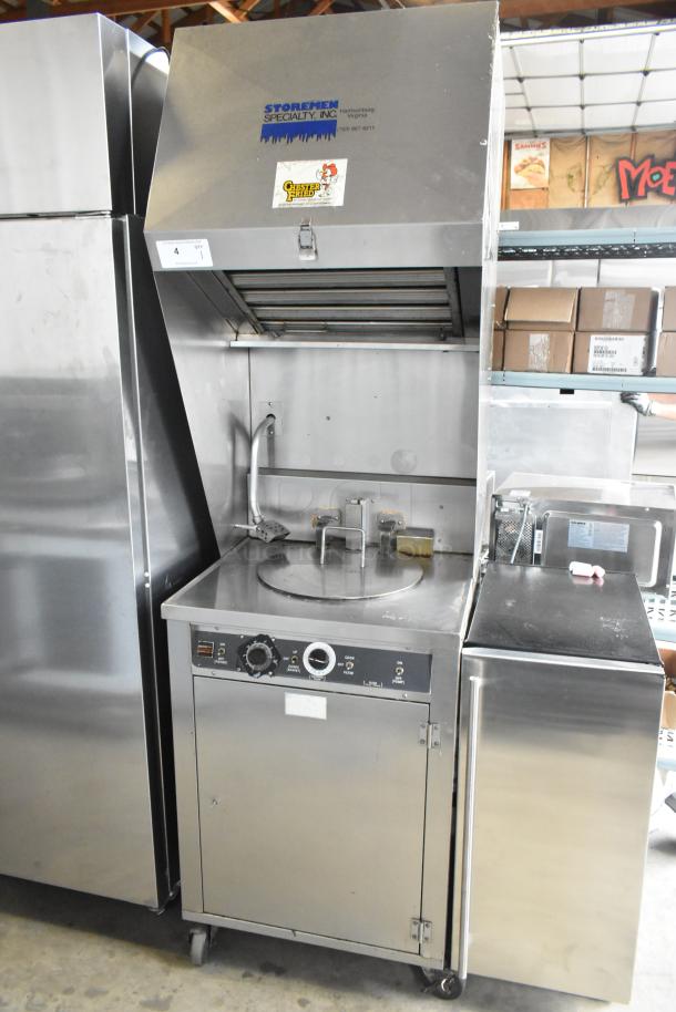Giles stainless steel electric deep fat fryer with ventless grease hood, 208 volts, 3 phase. Includes labels from Storemen and Chester Fried.