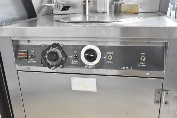 Giles stainless steel commercial electric deep fat fryer with ventless grease hood, 208V, 3 phase, visible control panel.