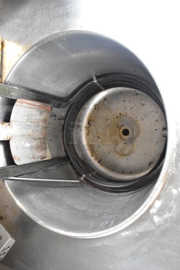 Giles stainless steel commercial deep fat fryer interior, ventless grease hood, 208V, 3-phase, used condition.