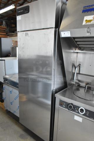 2022 Delfield GBSR1P-S stainless steel single-door reach-in cooler with poly coated racks, on commercial casters.