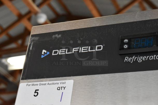 2022 Delfield GBSR1P-S stainless steel reach-in cooler with poly-coated racks and commercial casters. 115V, 1-phase, visible brand logo.