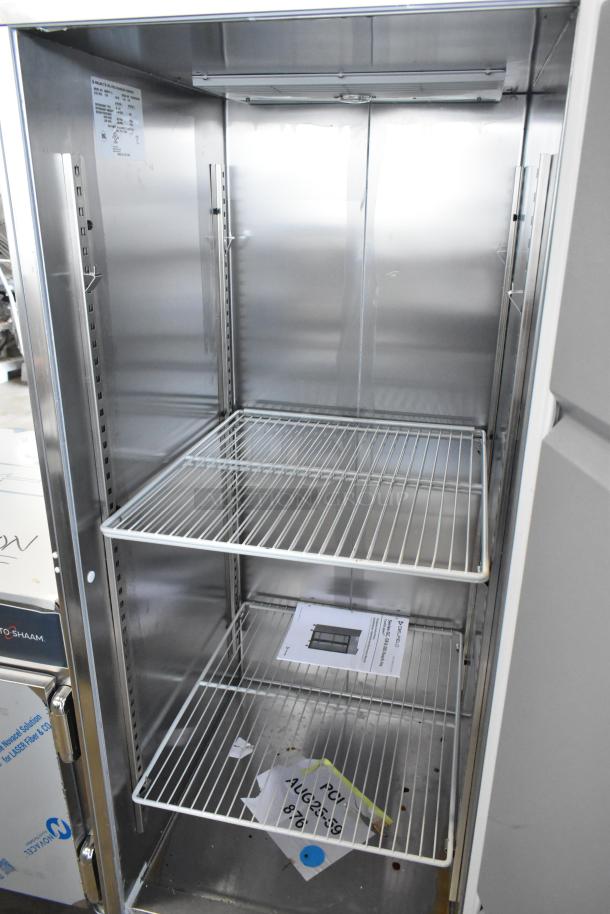 2022 Delfield GBSR1P-S stainless steel reach-in cooler with poly coated racks, commercial casters, and 115 volts.