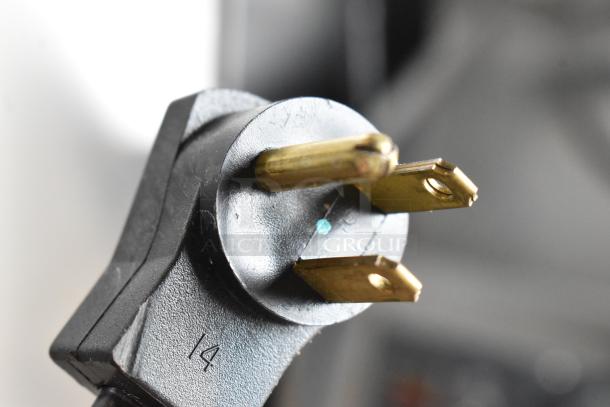 Power plug for 2022 Delfield GBSR1P-S stainless steel commercial cooler, 115 volts, 1 phase. Close-up view.