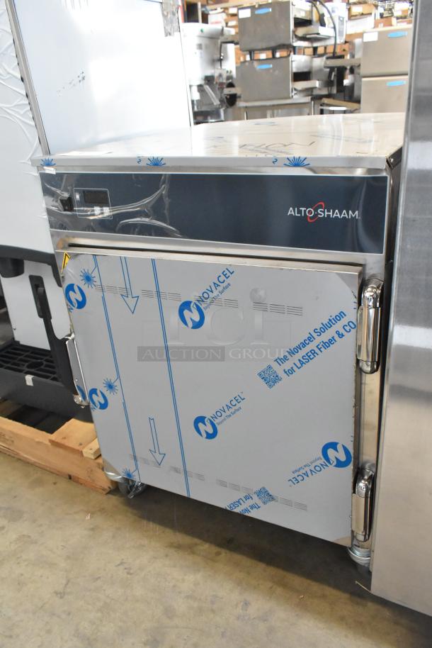 Brand new Alto Shaam 750-S stainless steel heated cabinet, commercial casters, door jammed, 120V, 1 phase, protective wrap.