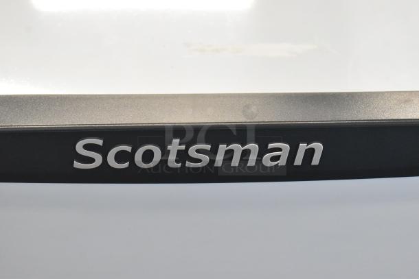 2024 Scotsman HID540A-1A stainless steel ice machine logo close-up, new with scratches; 40 lb bin, 115V, 1 phase.
