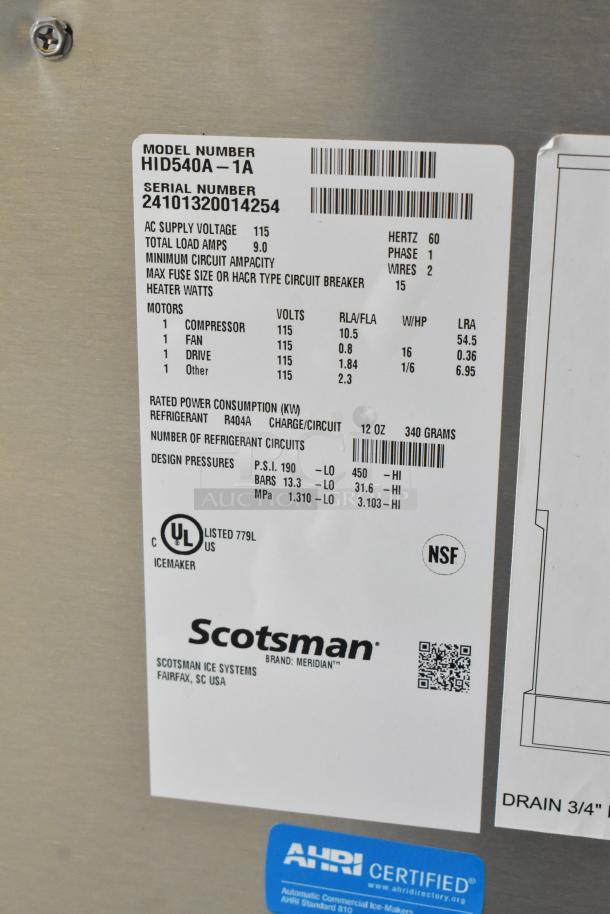 Scotsman HID540A-1A ice machine label, showing model, serial number, voltage, and certification details on stainless steel.