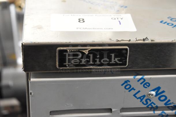Perlick DDS36 stainless steel kegerator with minor scratches, brand logo visible. 115 volts, 1 phase power. Auction tag on top.
