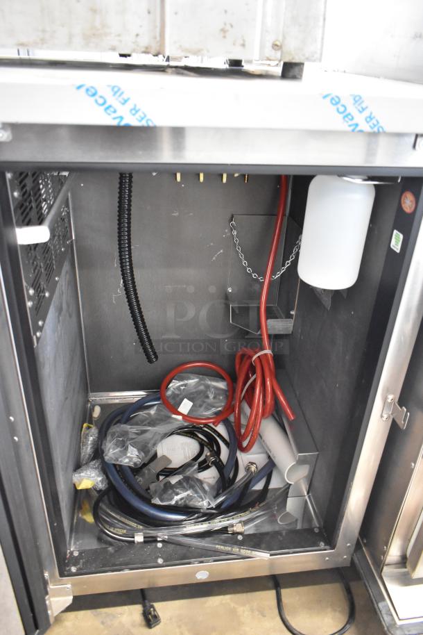 BRAND NEW SCRATCH AND DENT Perlick DDS36 stainless steel kegerator interior showing hoses and connections, 115V, 1 Phase.